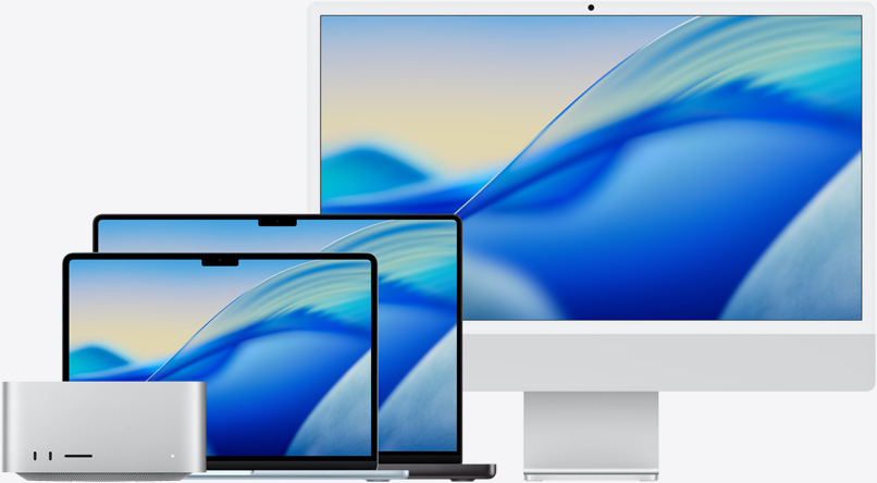 macOS Tahoe-baggrunden vist på forskellige Mac-modeller. Fra venstre mod højre: Mac Studio, 13" MacBook Air i farven himmelblå, 14" MacBook Pro i space black og 24" iMac i sølv